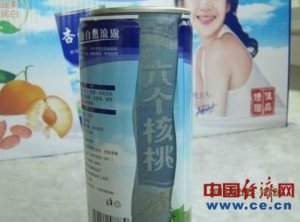 河南綠蜜康牌核桃露被指使用六個核桃舊罐